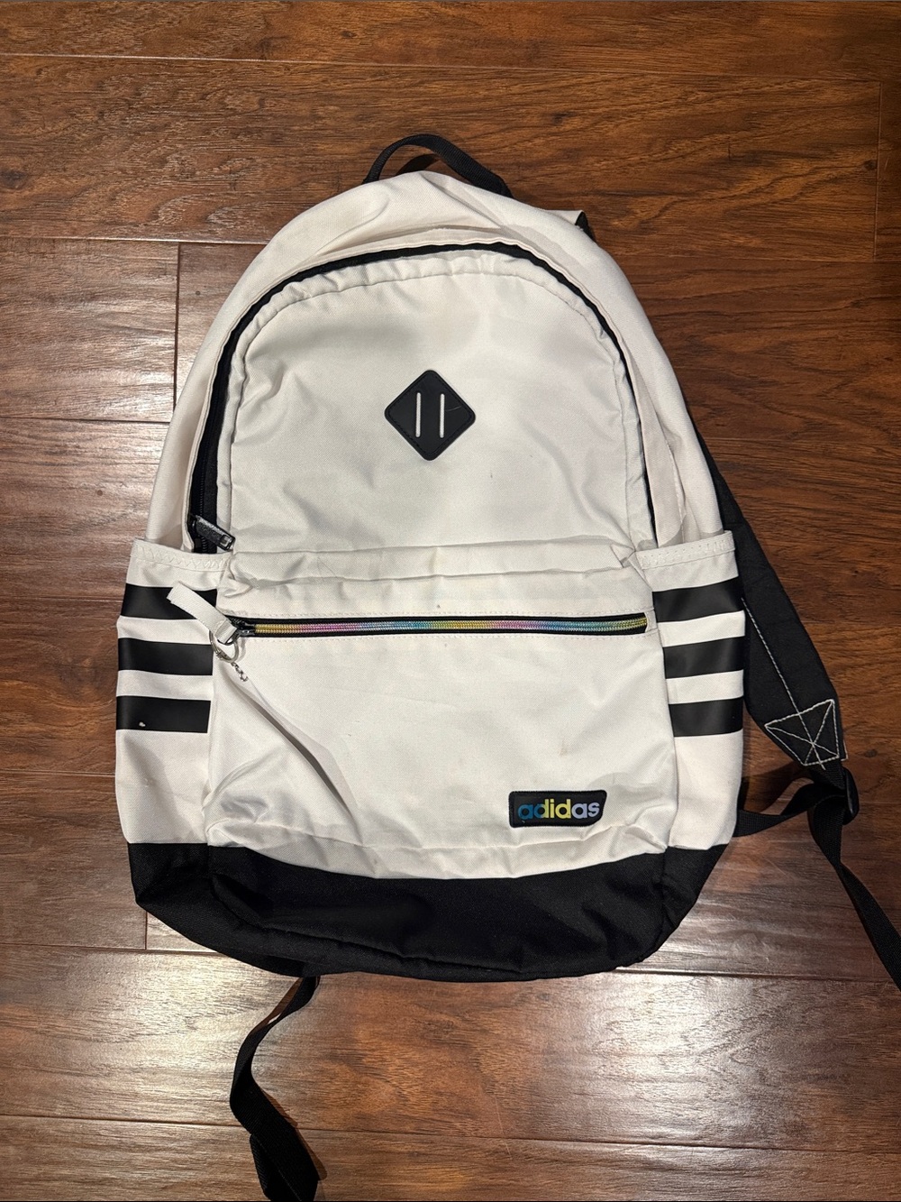 adidas White and Black Stripe Backpack with Rainbow Zip Accent
